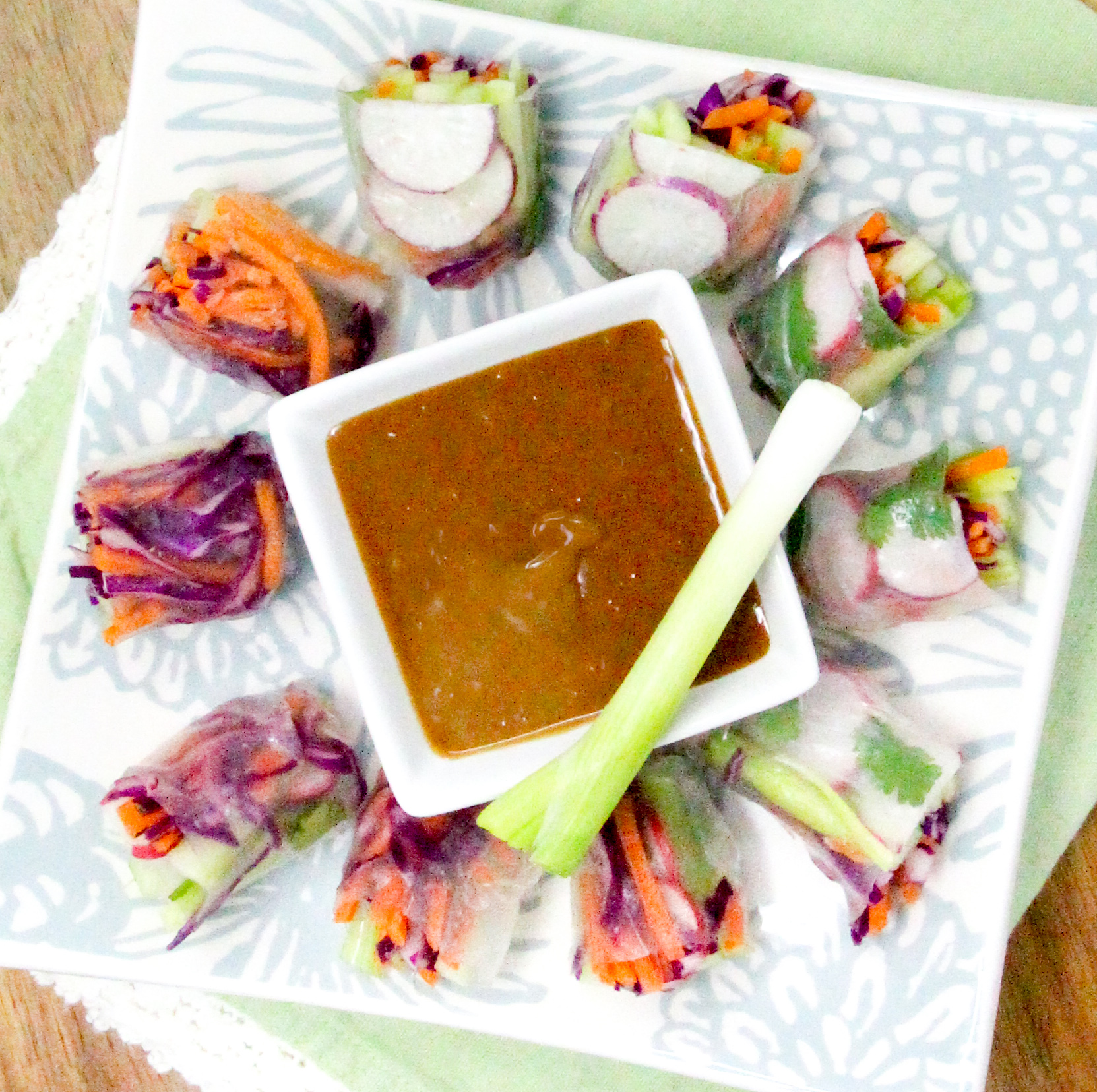 Vegetarian Spring Rolls with a Thai-inspired peanut butter dipping sauce is a delicious no-cook appetizer or side dish! Recipe shared with permission granted by Maddie Day, author of MURDER AT A CAPE BOOK STORE. 