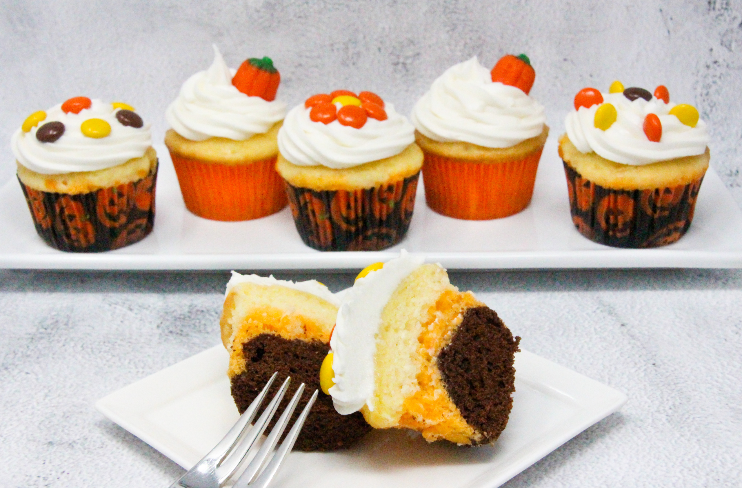 Triple-Layer Halloween Cupcakes is quick and easy, with a delicious combination of chocolate and orange flavors. With simple Reese’s Pieces used to decorate in orange and brown Halloween colors, these cupcakes will be sure to please your ghosts and ghouls! Recipe shared with permission granted by Carol J. Perry, author of A TRIPLE-LAYER HALLOWEEN MURDER.