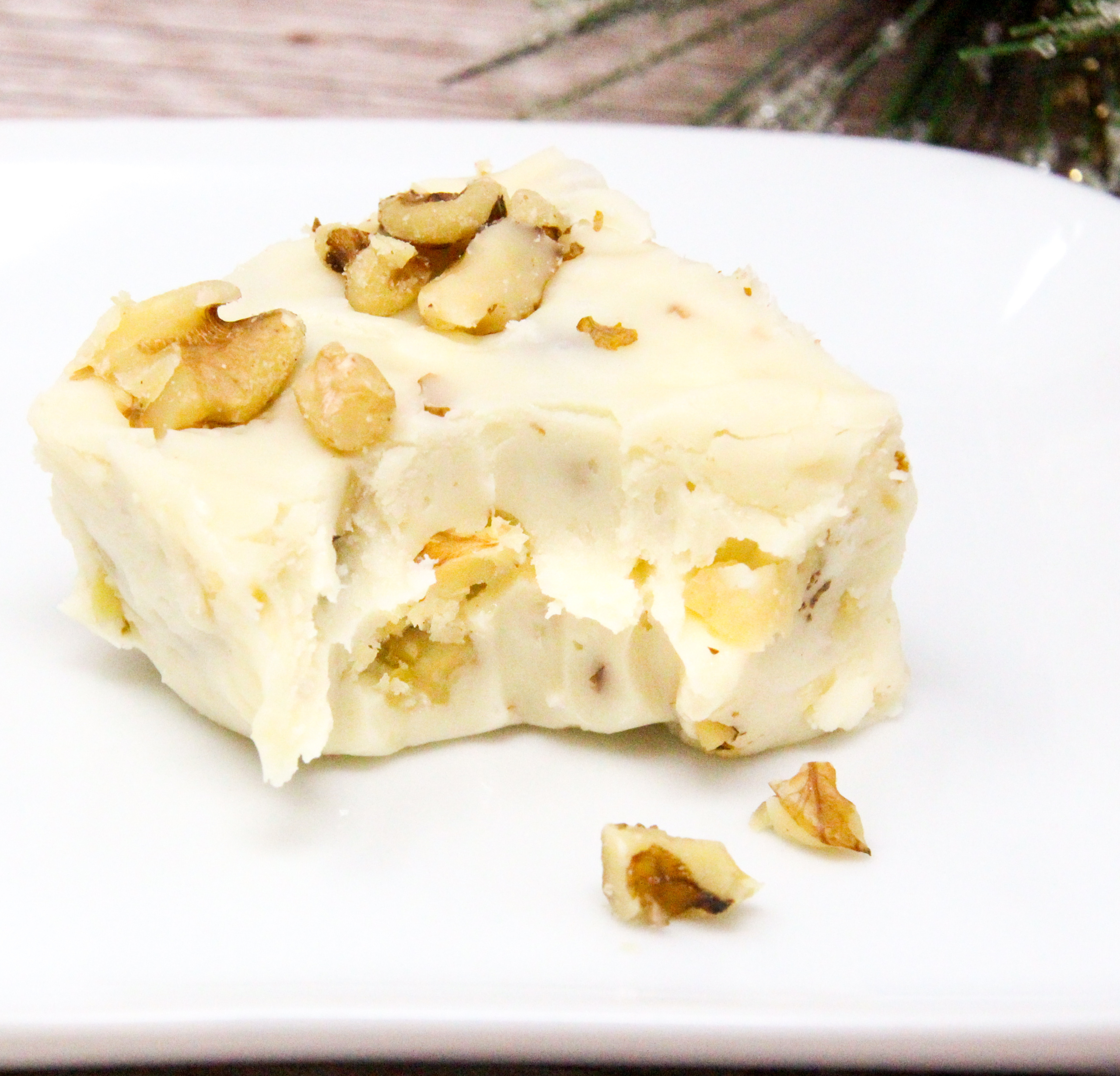 Using only six staple ingredients, and using the microwave to melt the white chocolate, Easy Maple Fudge comes together in a snap, making it a great addition to Christmas goodie platters or as a yummy gift to family and friends. Recipe shared with permission granted by Nancy Coco, author of HAVING A FUDGY CHRISTMAS TIME. 