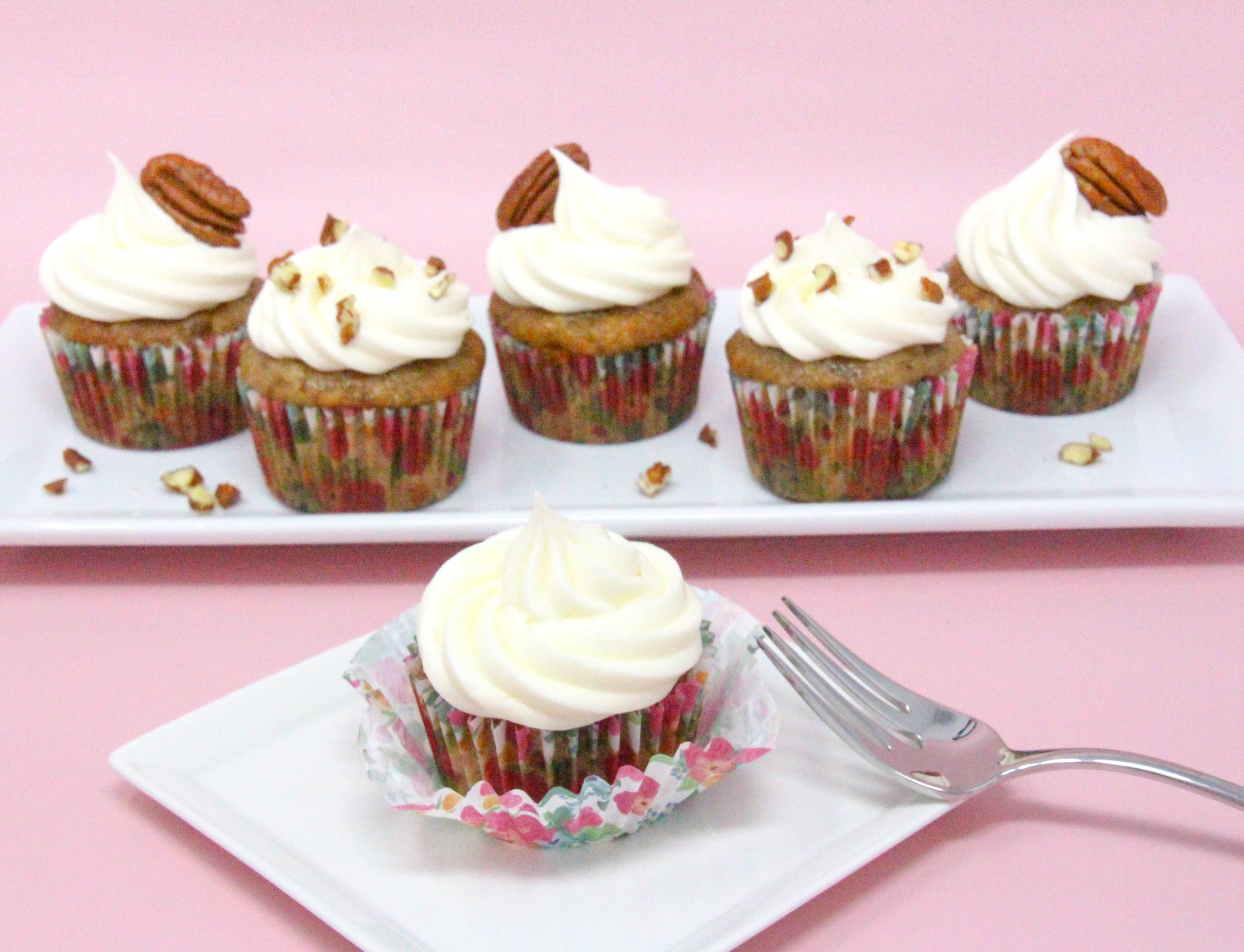 The pineapple and bananas make these Hummingbird Cupcakes extra moist and the pecans add just the right amount of crunch, while the tangy cream cheese frosting is the crowning glory. Recipe shared with permission granted by Jenn McKinlay, author of Strawberried Alive. 