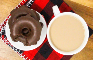 Double Fudge Donuts contain a couple surprise (healthy) ingredients in the recipe that no one would ever guess. Rich and moist on their own but when combined with the cooked fudge frosting it’s like having a sinfully delicious breakfast! Recipe shared with permission granted by Ginger Bolton, author of DOUBLE GRUDGE DONUTS. 