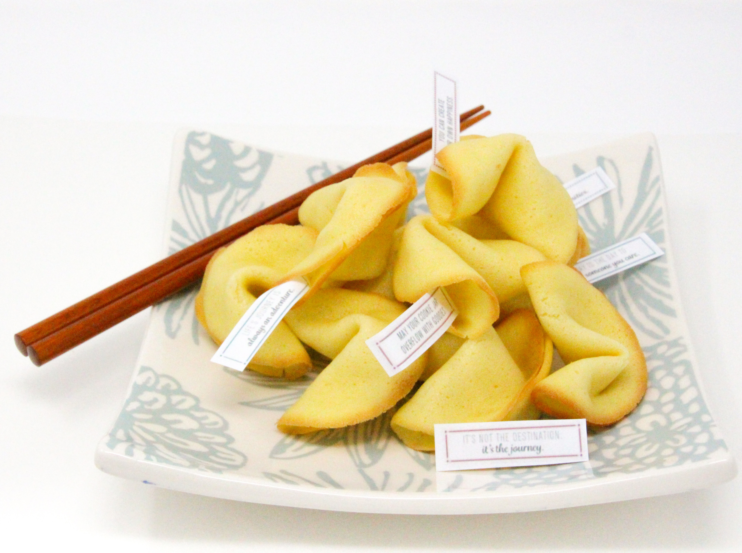 Fated Fortune Cookies are super easy to mix up and are delicious. Baking them requires patience, however, since you can only bake 2, or maybe 3 at a time, and need nimble fingers to form the cookie shape as soon as they are removed from the oven. Recipe shared with permission granted by Jennifer J. Chow, author of ILL-FATED FORTUNE. 