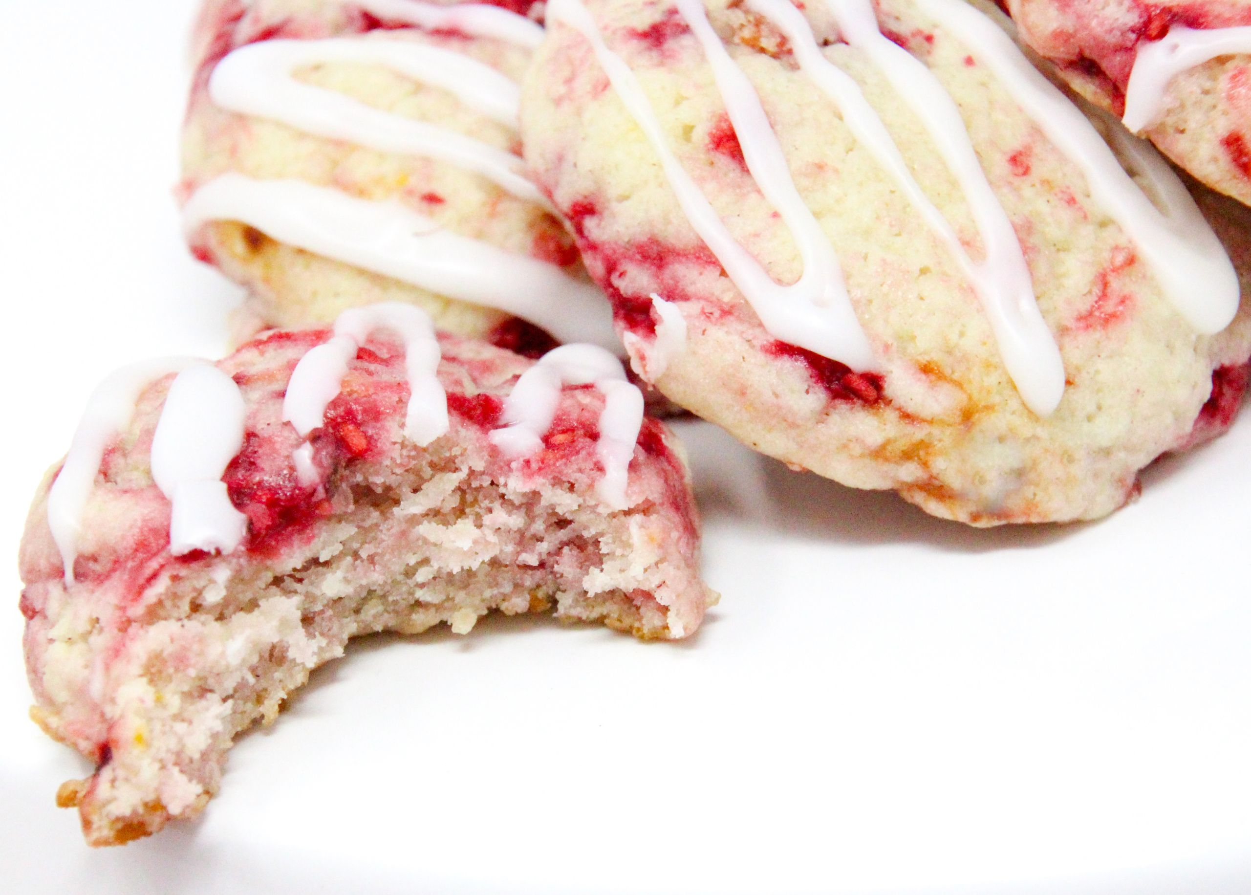 Lemon Raspberry Delights are a cake-like cookie filled with bits of real raspberries that complement the tart flavor of lemon. Recipe shared with permission granted by Daryl Wood Gerber, author of A TWINKLE OF TROUBLE. 