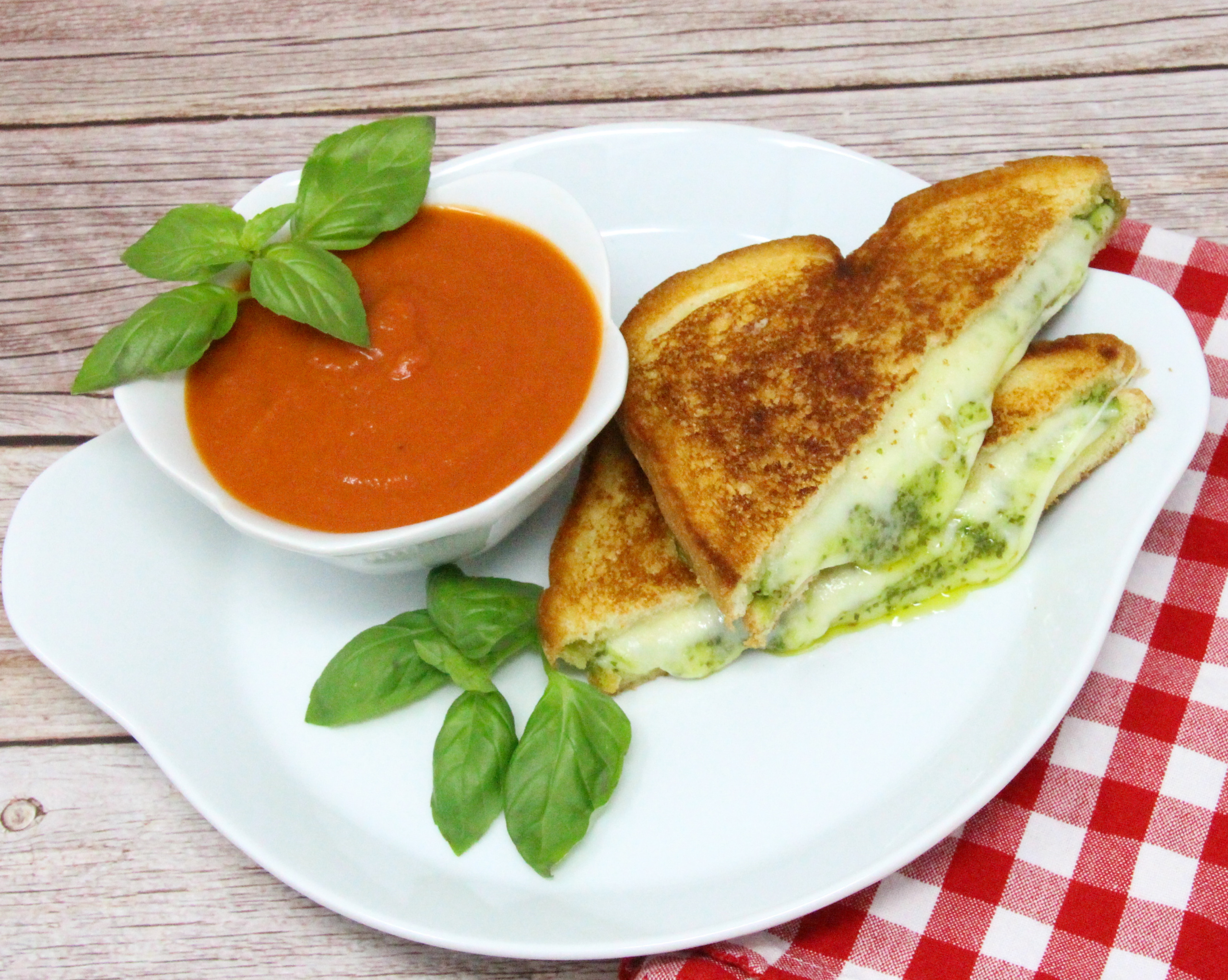 Zesty Pesto Grilled Cheese Sandwich pairs pesto with creamy provolone while the crunchy exterior of the bread provides a nice contrast. Eaten on its own or with Grant’s Tomato Soup, this sandwich is a flavorful delight! Recipe shared with permission granted by Linda Reilly, author of BRIE CAREFUL WHAT YOU WISH FOR. 
