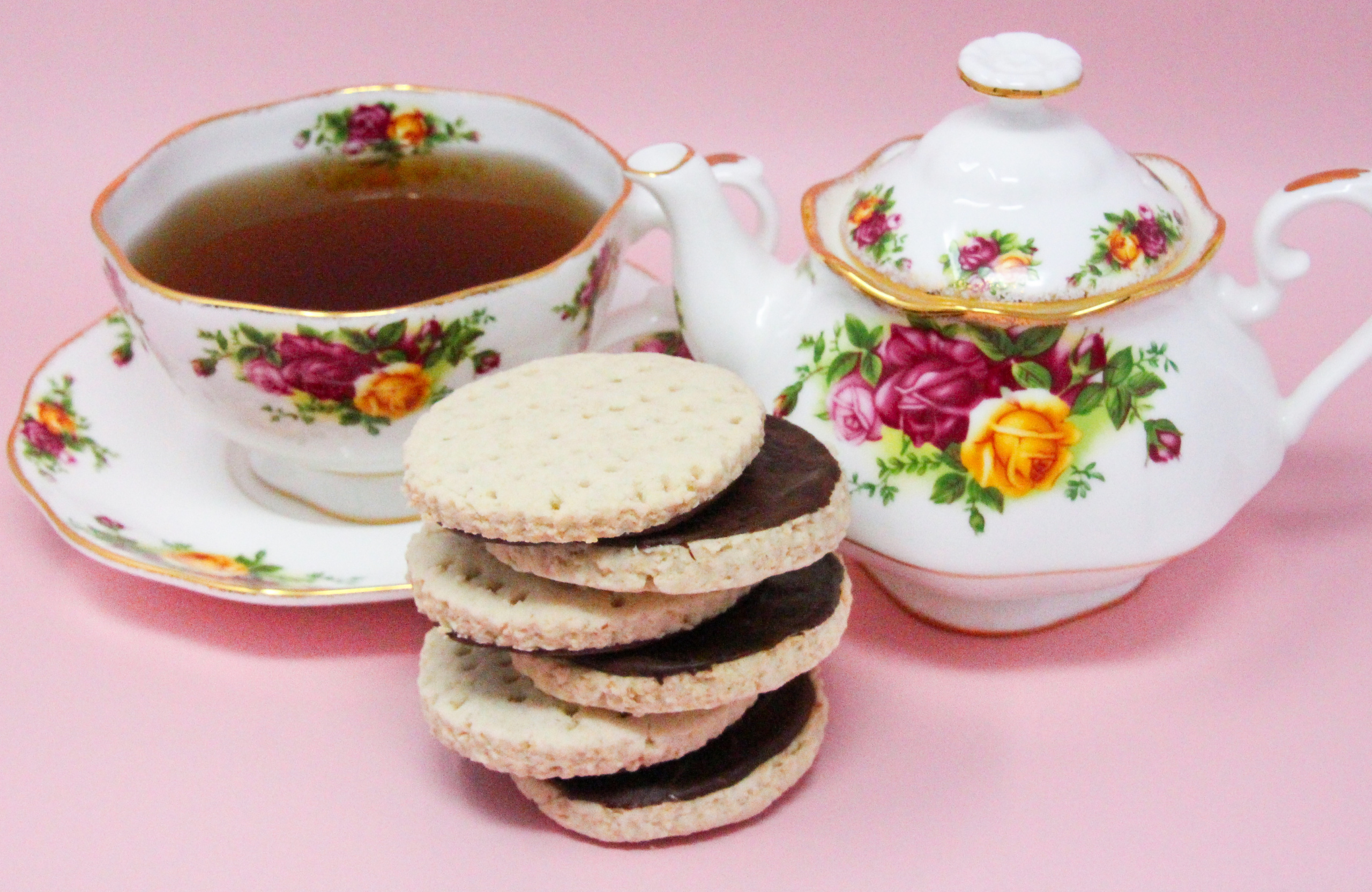 Bunny's Chocolate Digestive Biscuits are a British teatime treat! Oatmeal based, the nice chewy texture is enhanced with the addition of chocolate. Recipe shared with permission granted by Darci Hannah, author of A FATAL FEAST AT BRAMSFORD MANOR. 