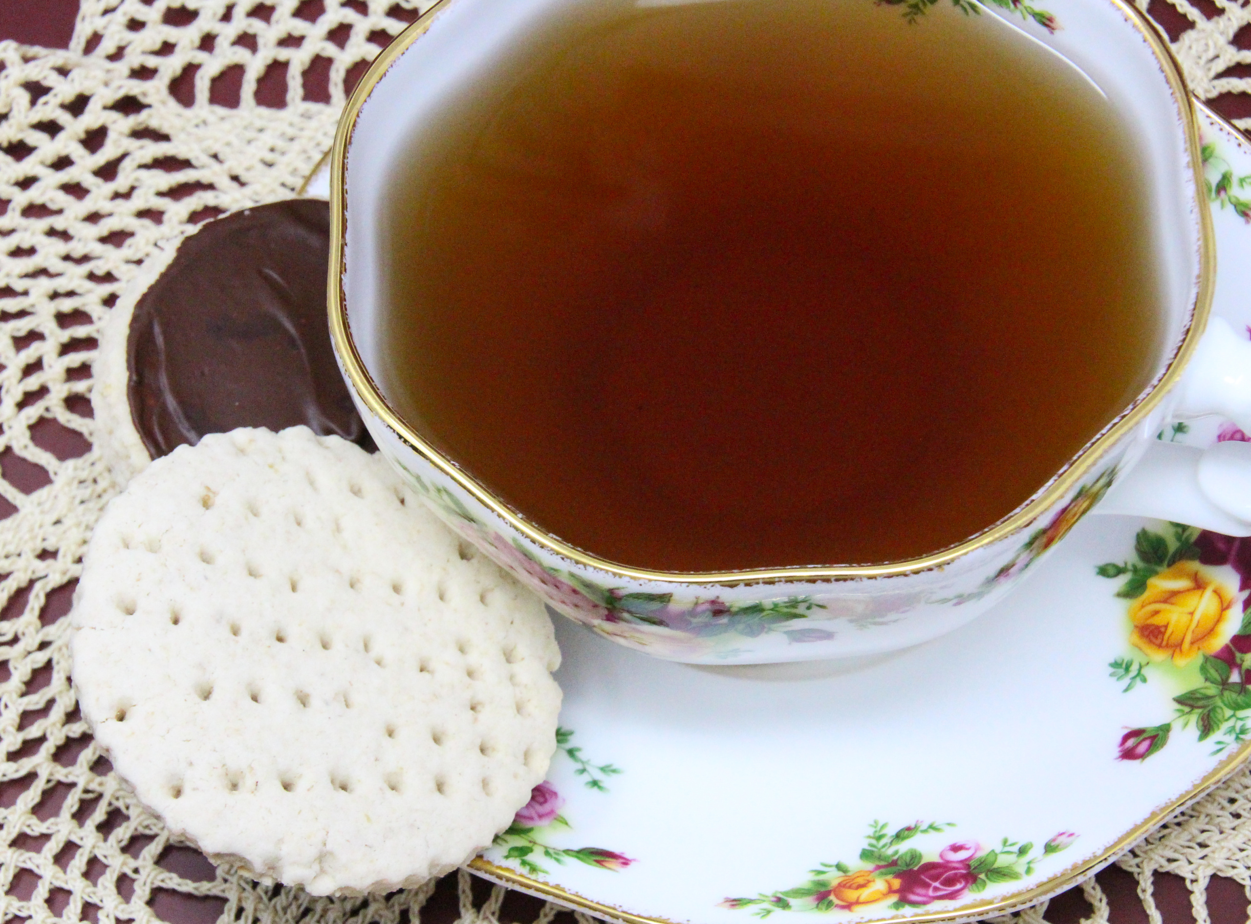 Bunny's Chocolate Digestive Biscuits are a British teatime treat! Oatmeal based, the nice chewy texture is enhanced with the addition of chocolate. Recipe shared with permission granted by Darci Hannah, author of A FATAL FEAST AT BRAMSFORD MANOR. 