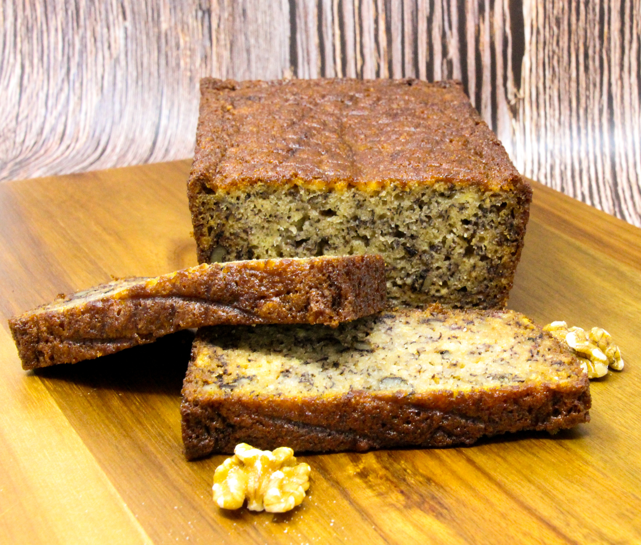 Banana Bread with Walnuts uses three whole bananas, which makes the bread ultra-moist, without using a ton of butter or vegetable oil. Plus, the walnuts add a pleasing crunch to the bread. Recipe shared with permission granted by Vicki Delany, author of TROUBLE IS BREWING. 