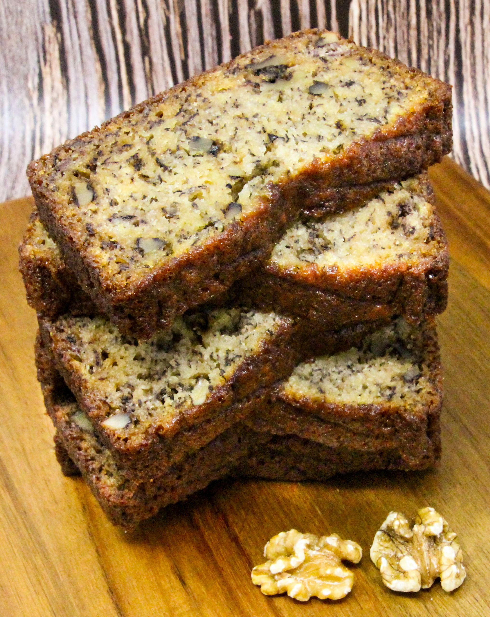 Banana Bread with Walnuts uses three whole bananas, which makes the bread ultra-moist, without using a ton of butter or vegetable oil. Plus, the walnuts add a pleasing crunch to the bread. Recipe shared with permission granted by Vicki Delany, author of TROUBLE IS BREWING. 