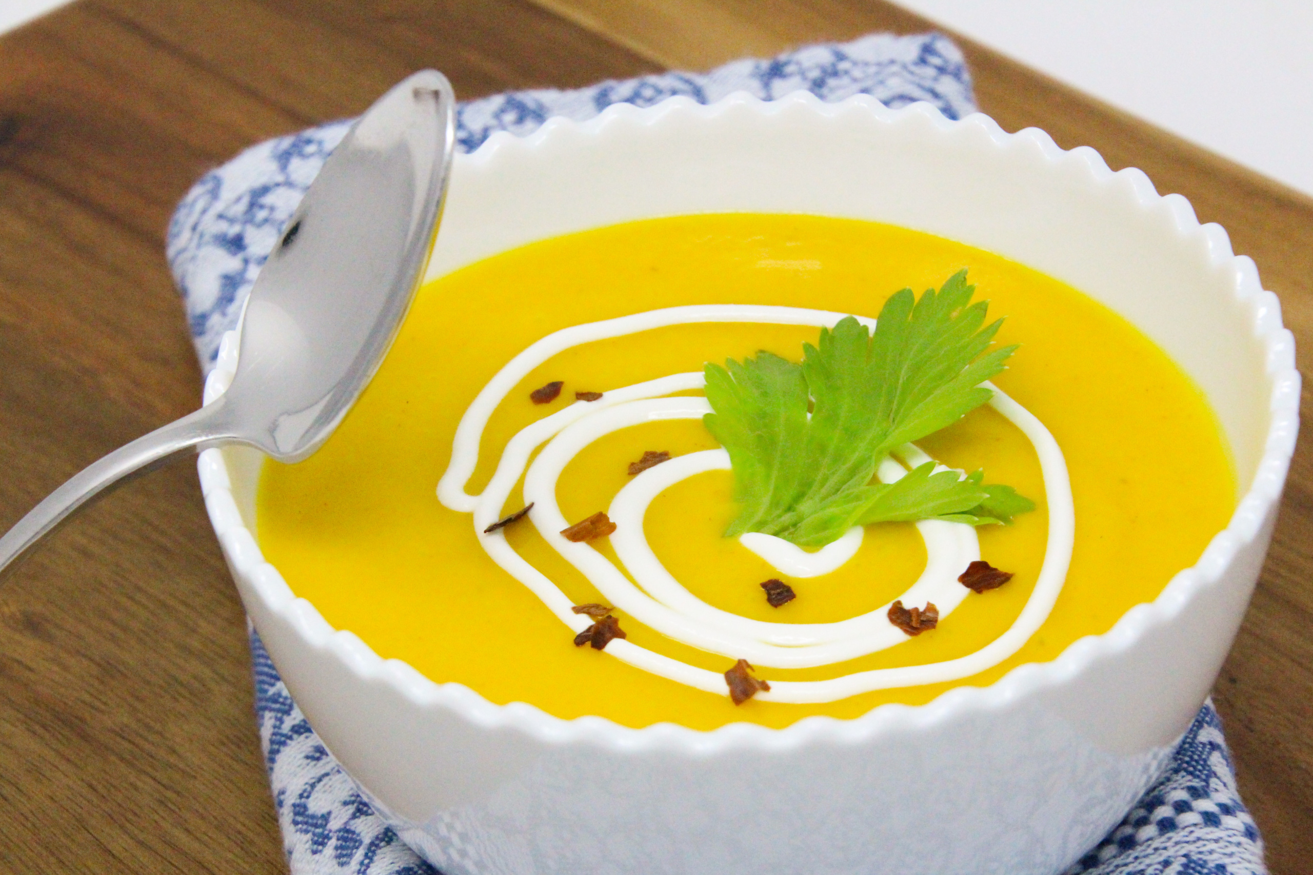 Curried Butternut Squash Soup is chockful of veggies with no added cream or dairy. The soup still tastes creamy and satisfying, with just the right amount of heat thanks to the curry powder and pepper flakes. Recipe shared with permission granted by Vicki Delany, author of A SLAY RIDE TOGETHER WITH YOU. 