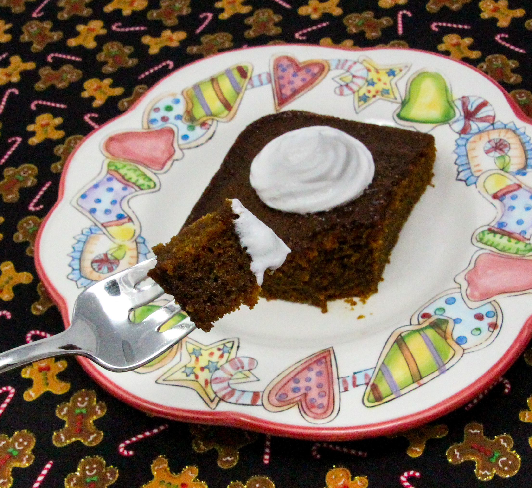 With a generous amount of spices and molasses, Mom’s Gingerbread is a dark, rich cake that captures the flavors of the holiday season perfectly. Recipe shared with permission granted by Lee Hollis, author of DEATH OF A GINGERBREAD MAN. 