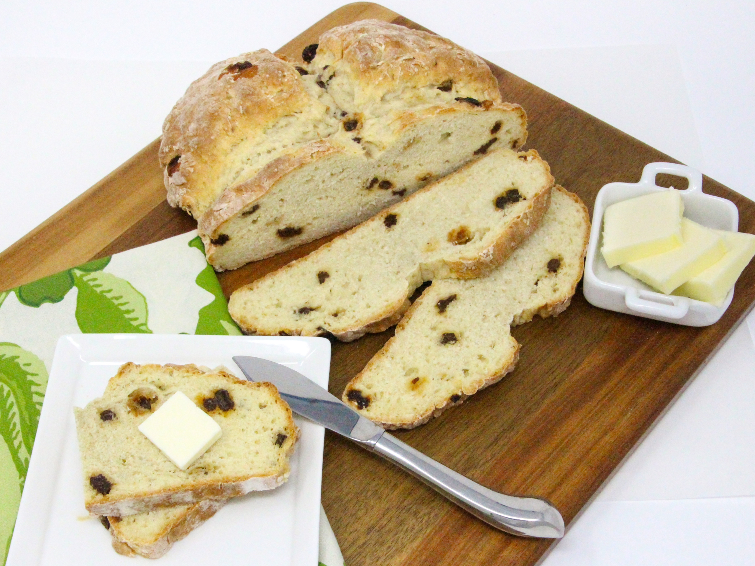 Traditional Irish Soda Bread is actually quite easy to make since there's no kneading or dough rising time required. With a slathering of creamy butter, this dense and flavorful bread is a delicious accompaniment to any meal--whether or not it's St. Patrick's Day. Recipe shared with permission granted by Carlene O'Connor, author of IRISH SODA BREAD MURDER. 