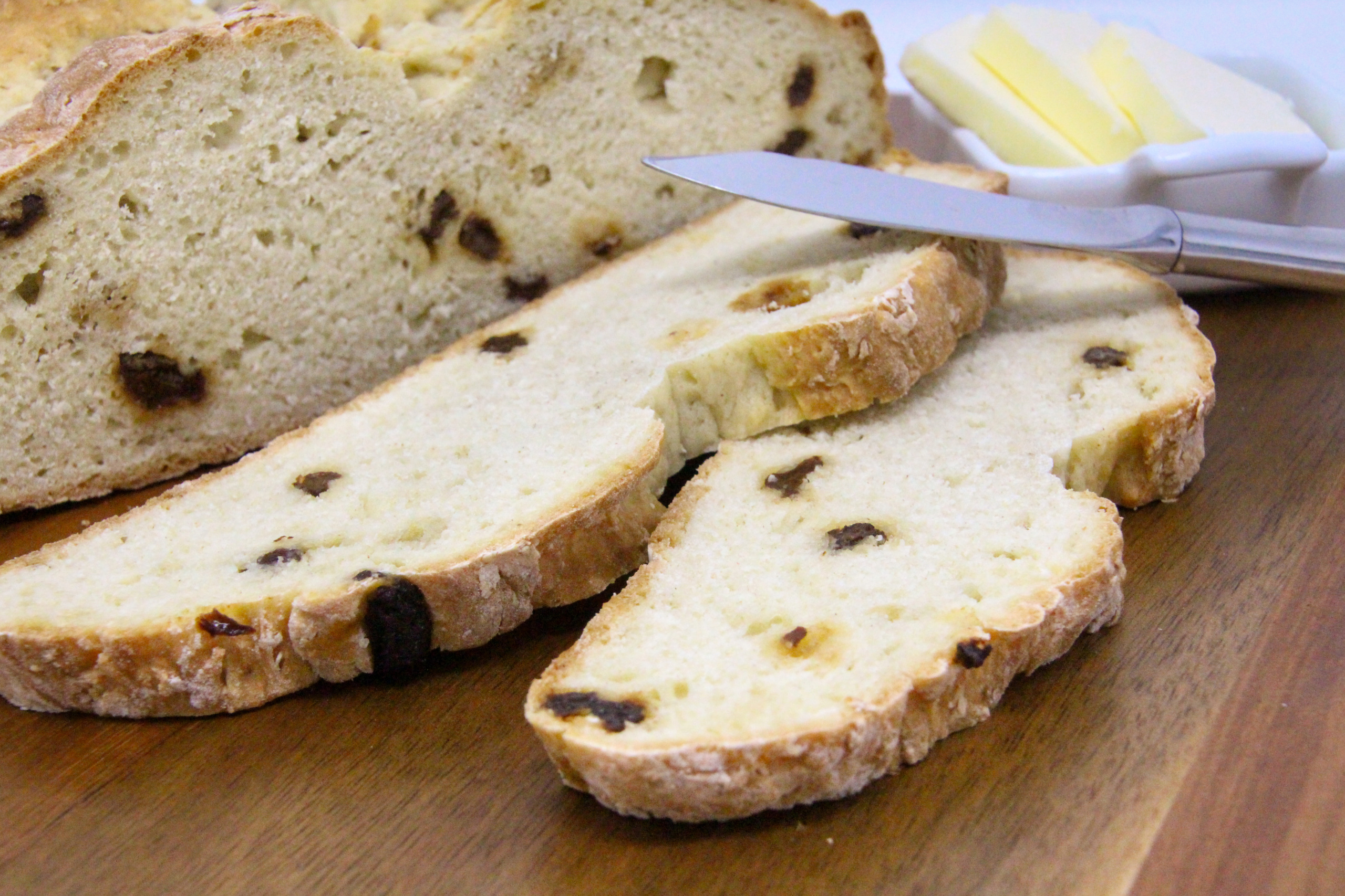 Traditional Irish Soda Bread is actually quite easy to make since there's no kneading or dough rising time required. With a slathering of creamy butter, this dense and flavorful bread is a delicious accompaniment to any meal--whether or not it's St. Patrick's Day. Recipe shared with permission granted by Carlene O'Connor, author of IRISH SODA BREAD MURDER. 