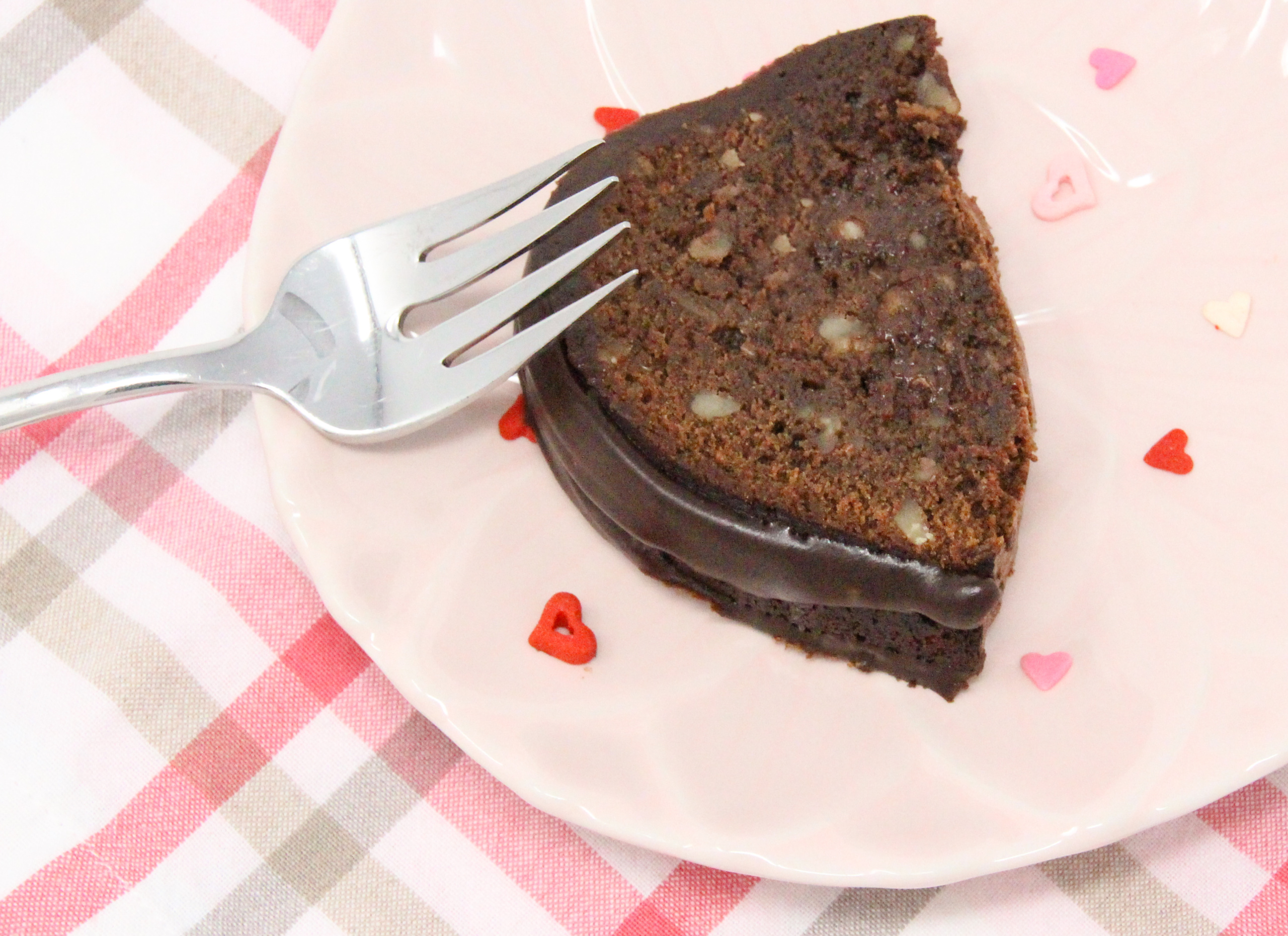 Tunnel of Fudge Cake is a rich and decadent Bundt cake! Using three kinds of chocolate, it is sure to please any chocolate lover. Recipe from CHOCOLATE CAN BE DEADLY by Kim Davis.