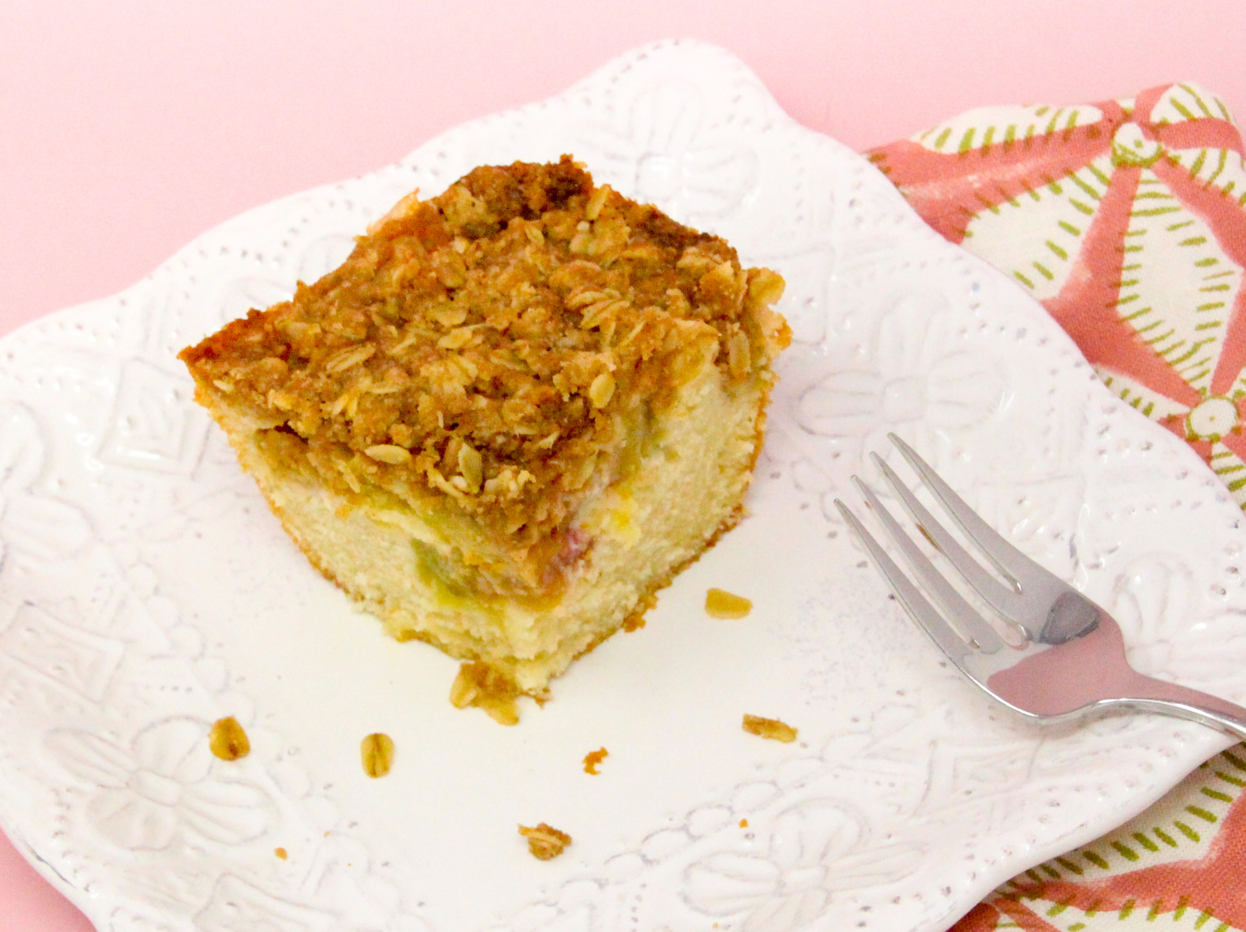 Rhubarb, with it's tart bite, is the perfect complement to a vanilla-based cake and a cinnamon crumble topping. Rhubarb Crumble Cake makes a great breakfast, afternoon coffee break snack, or served as dessert with a scoop of ice cream. Recipe shared with permission granted by Ellie Alexander, author of KILLING ME SOUFFLÉ.