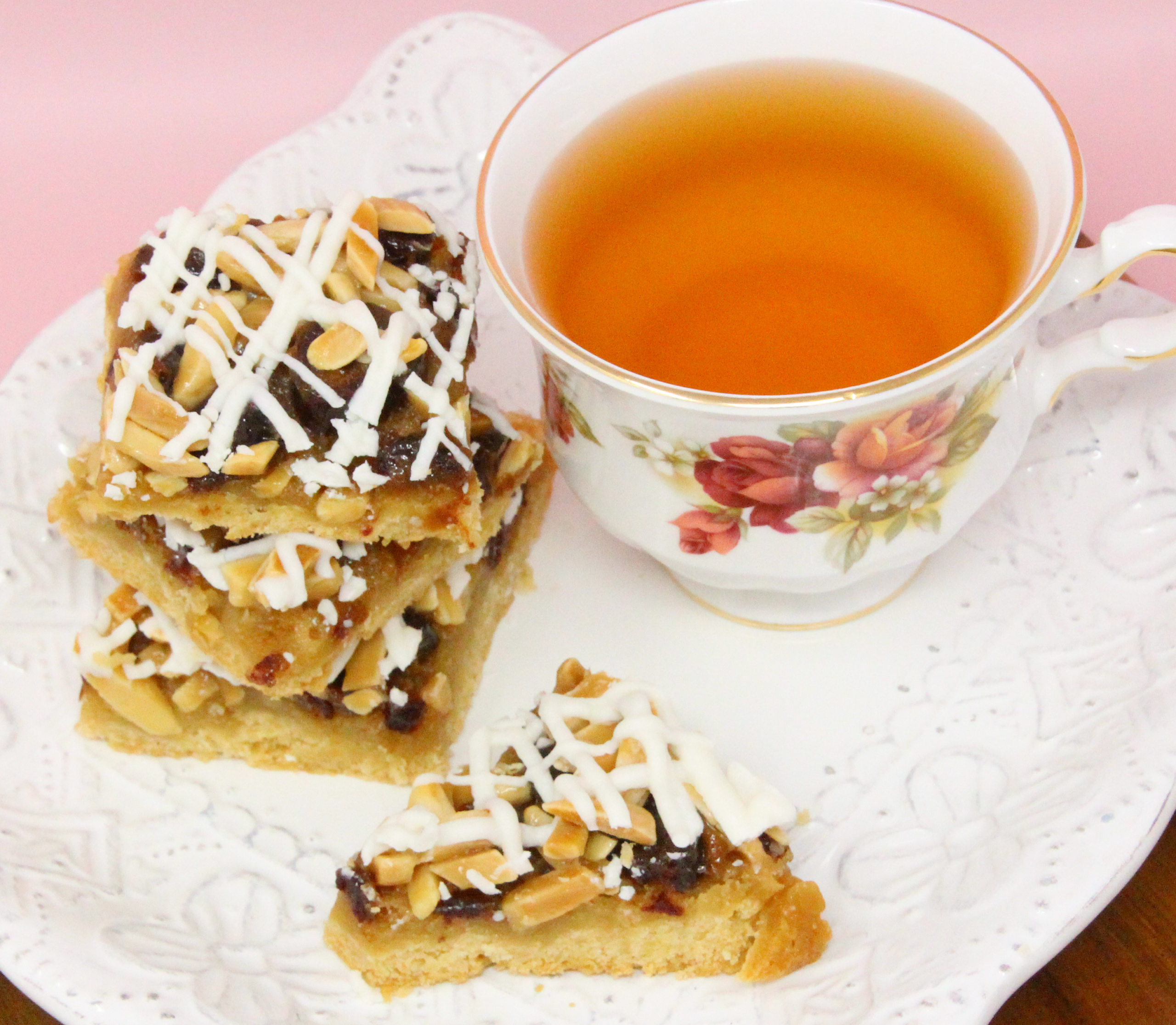 Nutty Almond Date Bars starts with a buttery, almond-flavored crust for the sweet date and crunchy almond filling. With the added white chocolate drizzle, this dessert is pure decadence and you’ll have people clamoring for more! Recipe shared with permission granted by Ellen Byron, author of SOLID GOLD MURDER. 