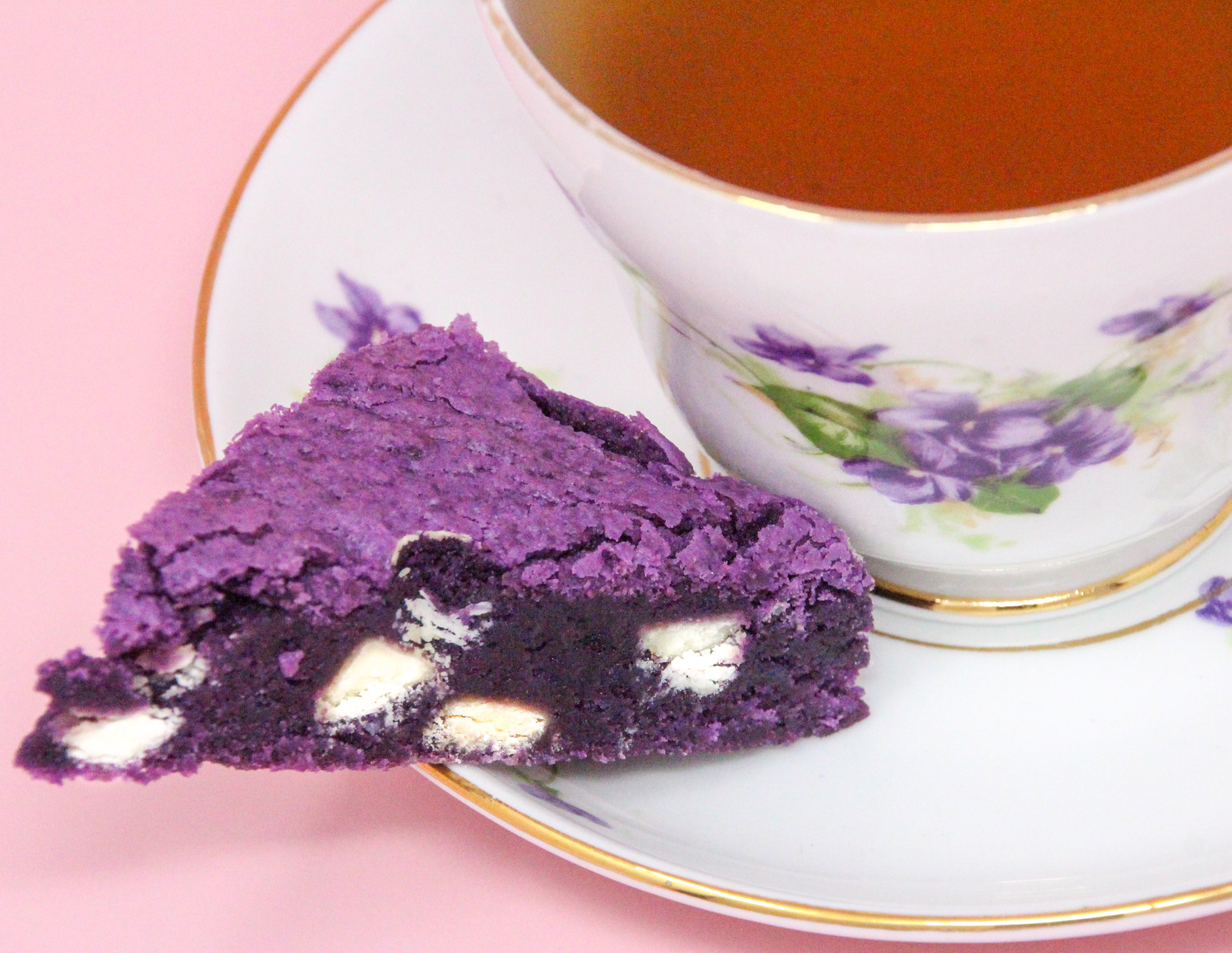 Ube Blondies uses ube jam (from a purple yam) for added sweetness and adds a fun purple color to the blondies. These have a perfect chewy texture with white chocolate chips providing a creamy contrast. Recipe shared with permission granted by Leslie Karst, author of WATERS OF DESTRUCTION.