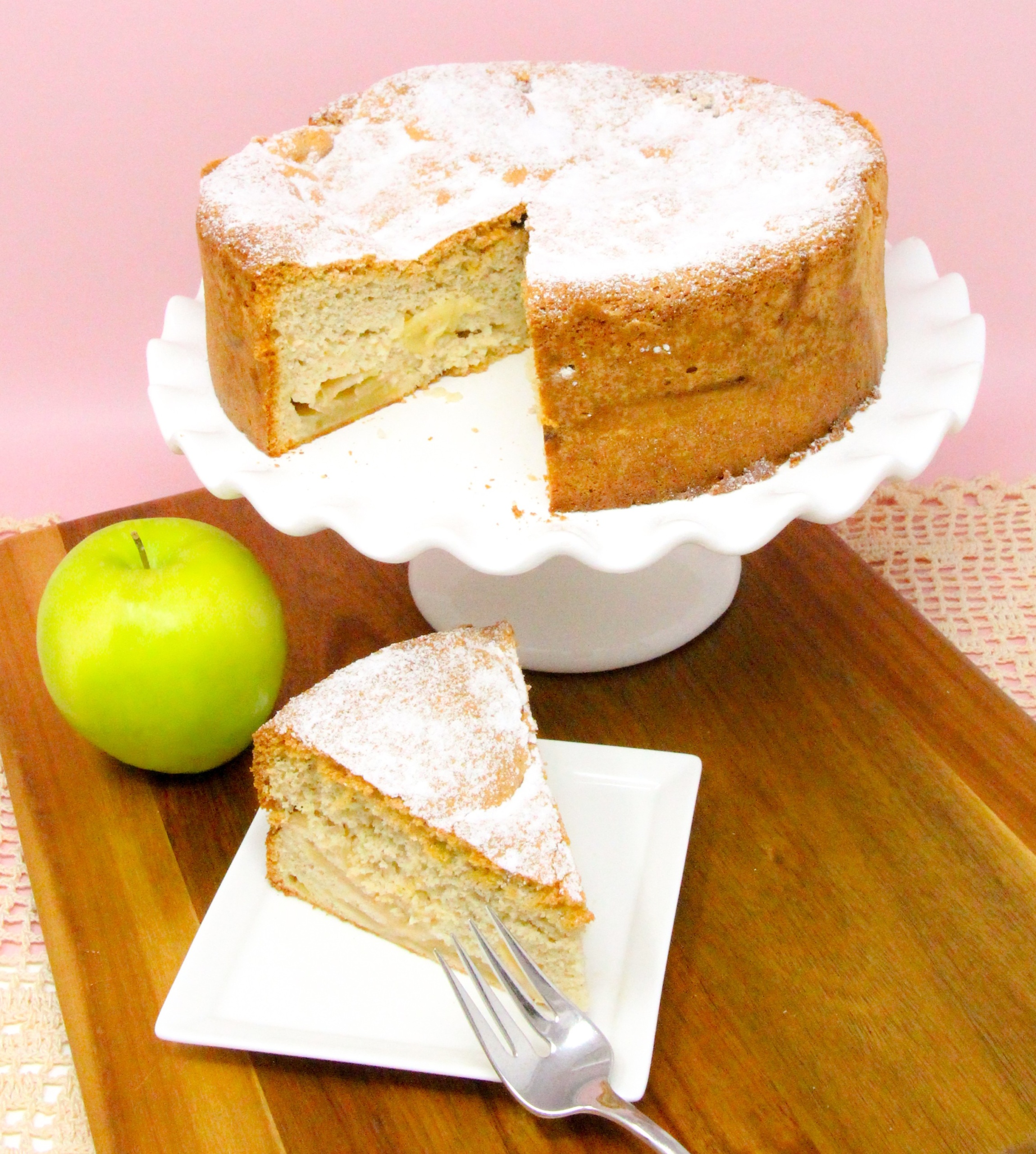 Apple Sharlotka uses a generous amount of apples to keep it moist and a generous number of eggs to give the cake lift and richness, resulting in a heavenly dessert reminiscent of angel food cake. Recipe shared with permission granted by Krista Davis, author of THE DIVA POACHES A BAD EGG.
