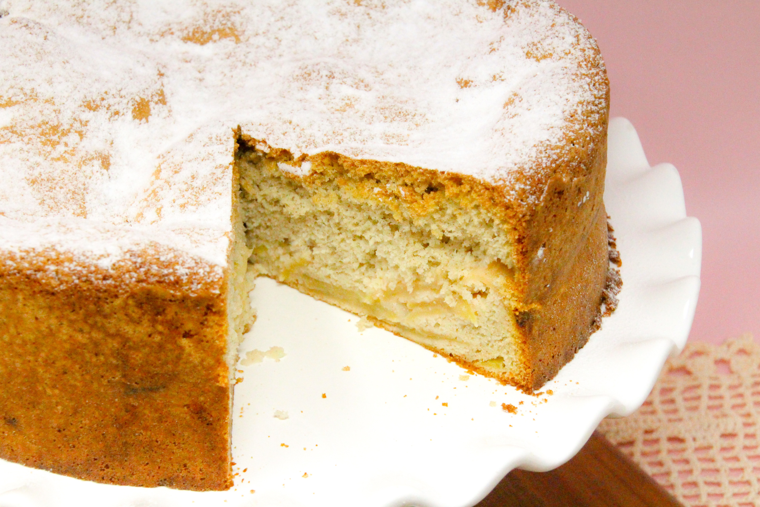 Apple Sharlotka uses a generous amount of apples to keep it moist and a generous number of eggs to give the cake lift and richness, resulting in a heavenly dessert reminiscent of angel food cake. Recipe shared with permission granted by Krista Davis, author of THE DIVA POACHES A BAD EGG.