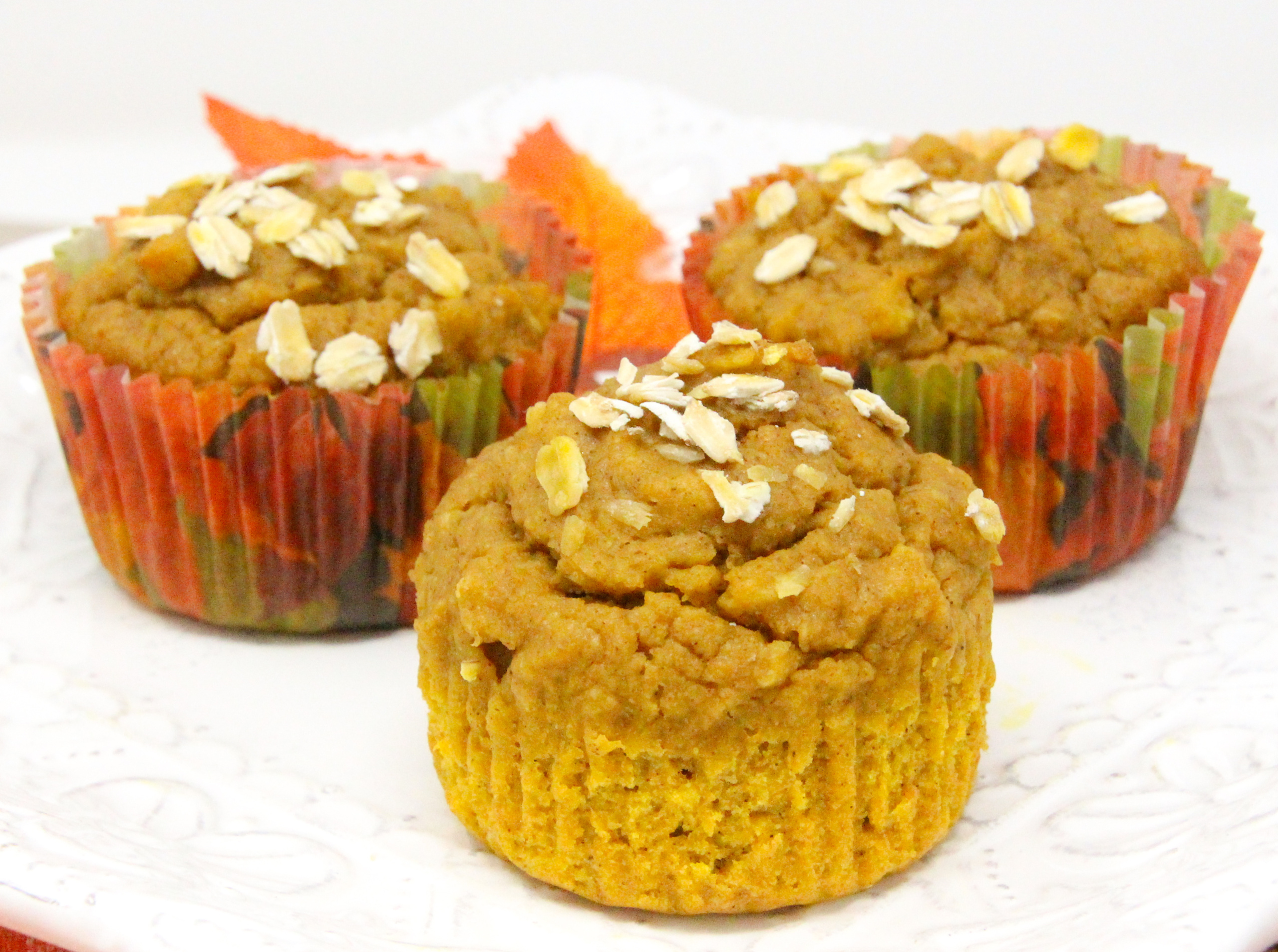 Halloween Muffins are pumpkin-based and not too sweet since they use maple syrup instead of sugar. With a good amount of pumpkin spice to ramp up the flavor, and whole wheat flour and oats, this a healthy and delicious breakfast or snack choice! Recipe shared with permission granted by Maddie Day, author of MURDER AT CAPE COSTUMERS. 