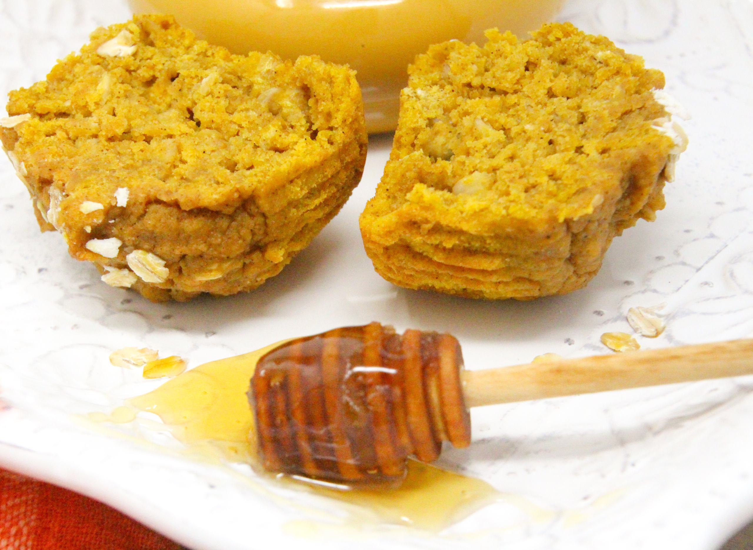 Halloween Muffins are pumpkin-based and not too sweet since they use maple syrup instead of sugar. With a good amount of pumpkin spice to ramp up the flavor, and whole wheat flour and oats, this a healthy and delicious breakfast or snack choice! Recipe shared with permission granted by Maddie Day, author of MURDER AT CAPE COSTUMERS. 