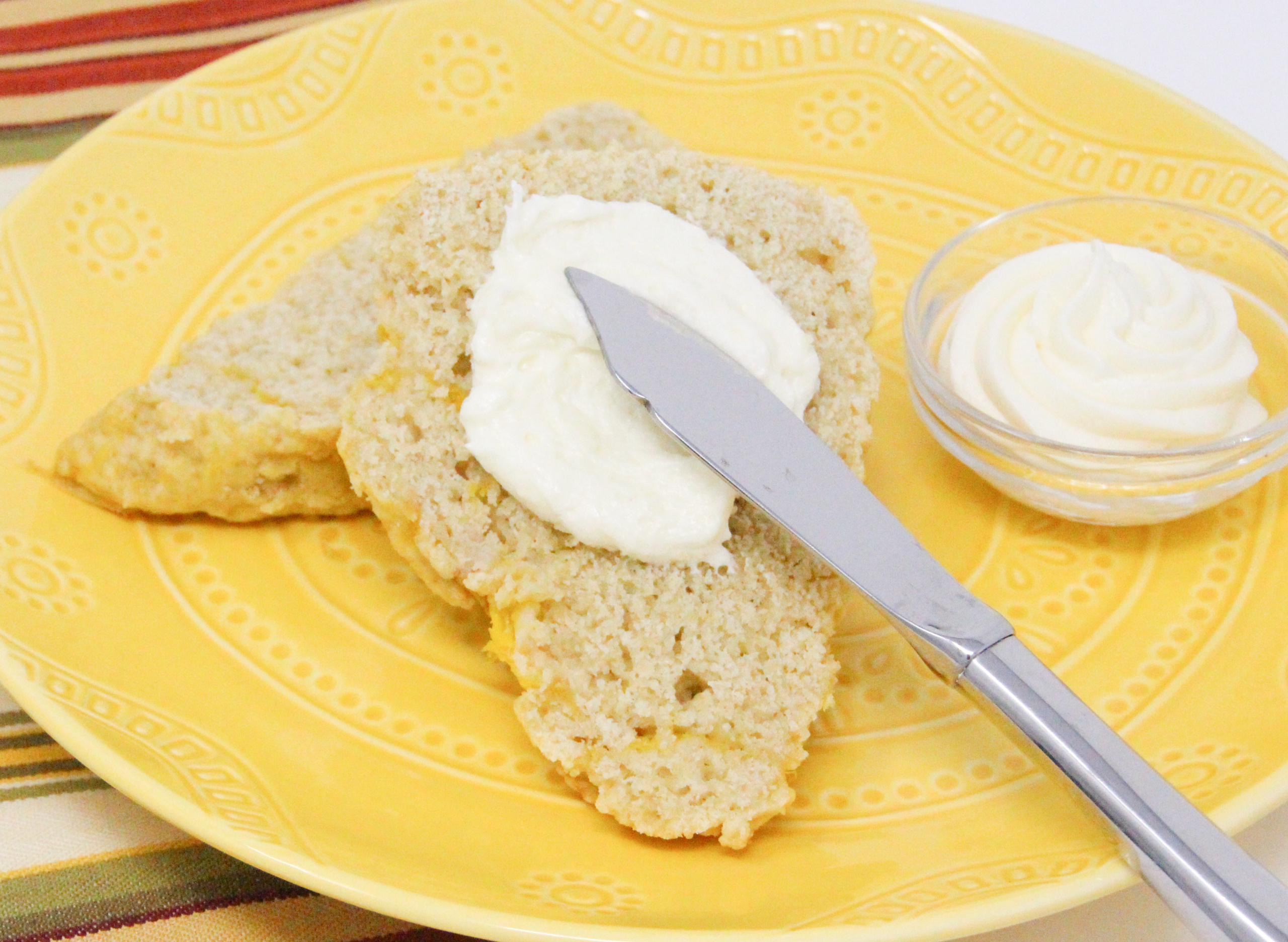 Mango Scones are flaky and rich thanks to a generous amount of butter and sour cream, but it’s the chunks of mango and cream cheese frosting that make them exceptional. Recipe shared with permission granted by Lucy Burdette, author of THE MANGO MURDERS.