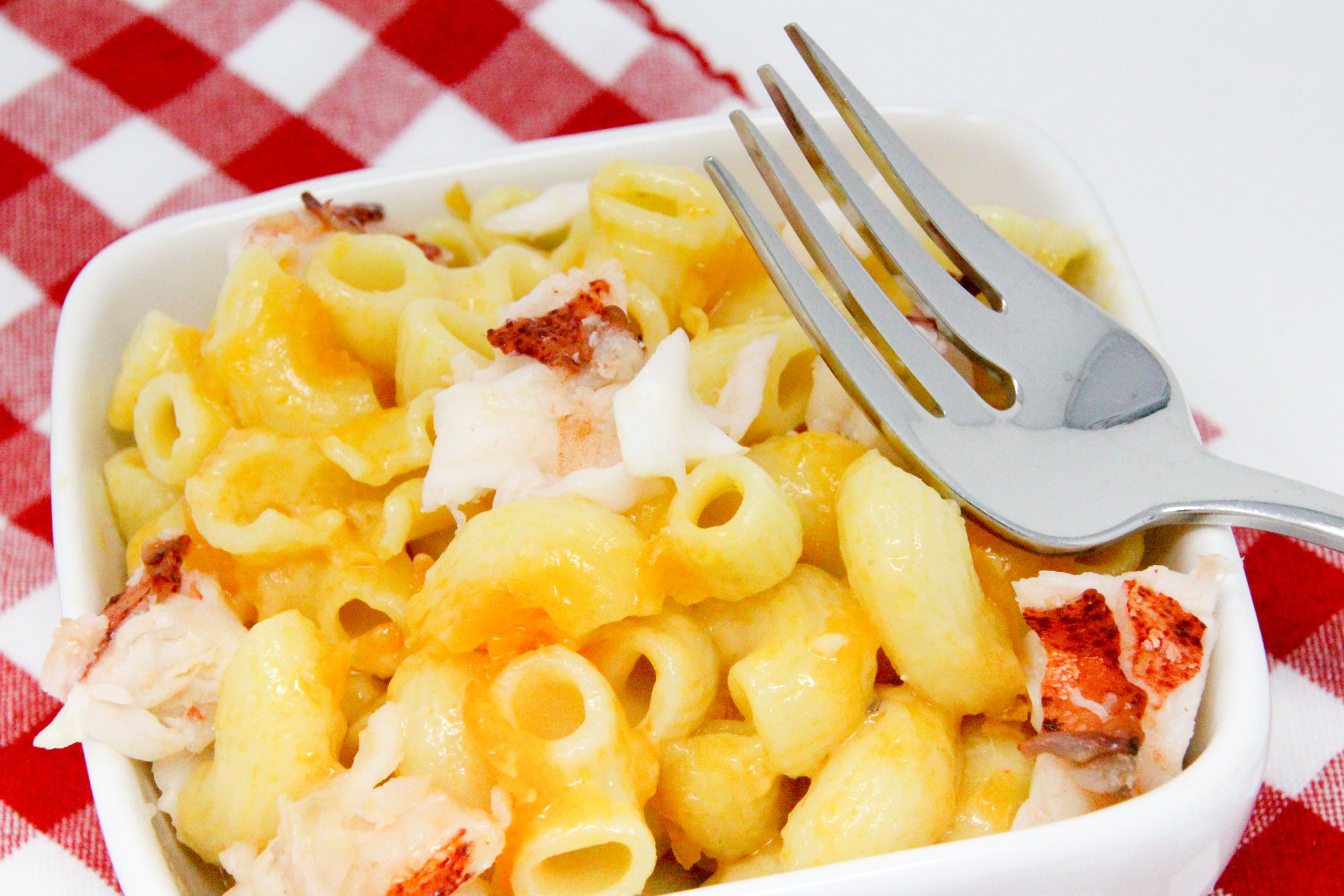 Here's a mac and cheese that's good enough to serve with lobster. Or with chunks of lobster gently swirled into the cheesy goo. ~Lynn Cahoon, author of AN AMATEUR SLEUTH’S GUIDE TO MURDER.