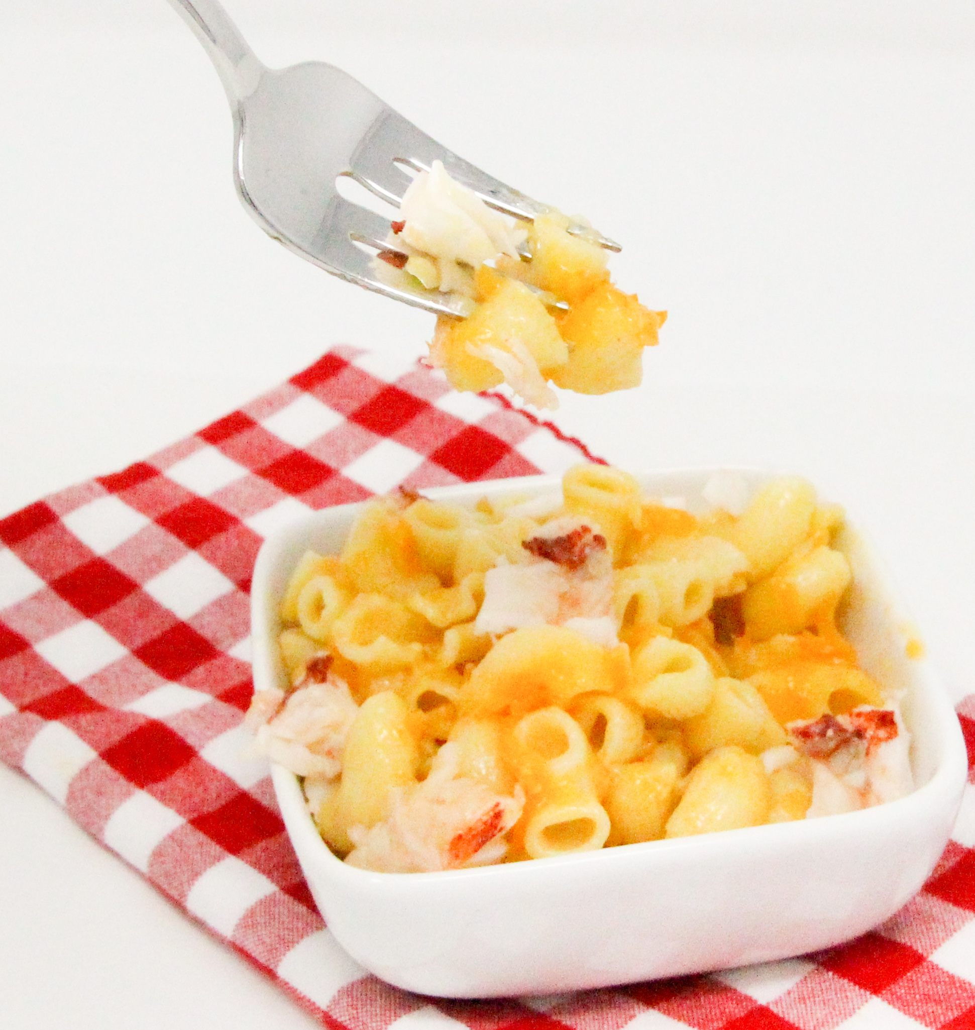 Here's a mac and cheese that's good enough to serve with lobster. Or with chunks of lobster gently swirled into the cheesy goo. ~Lynn Cahoon, author of AN AMATEUR SLEUTH’S GUIDE TO MURDER.