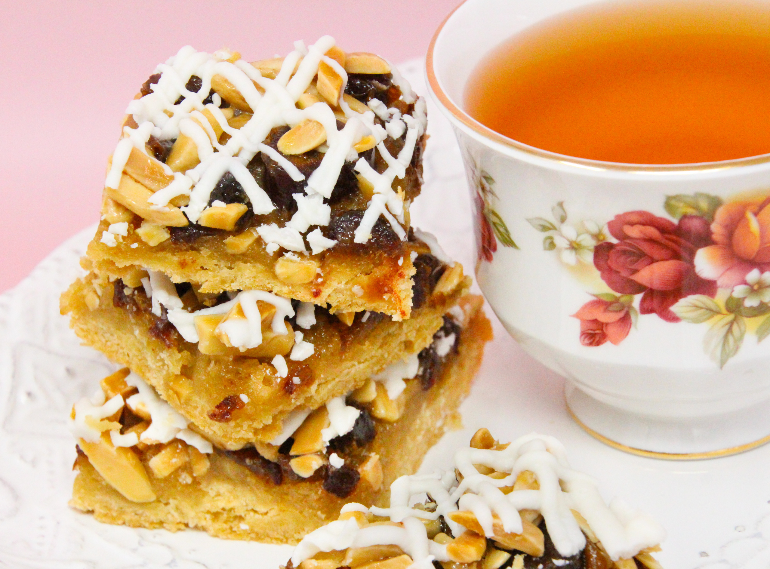 Nutty Almond Date Bars starts with a buttery, almond-flavored crust for the sweet date and crunchy almond filling. With the added white chocolate drizzle, this dessert is pure decadence and you’ll have people clamoring for more! Recipe shared with permission granted by Ellen Byron, author of SOLID GOLD MURDER. 