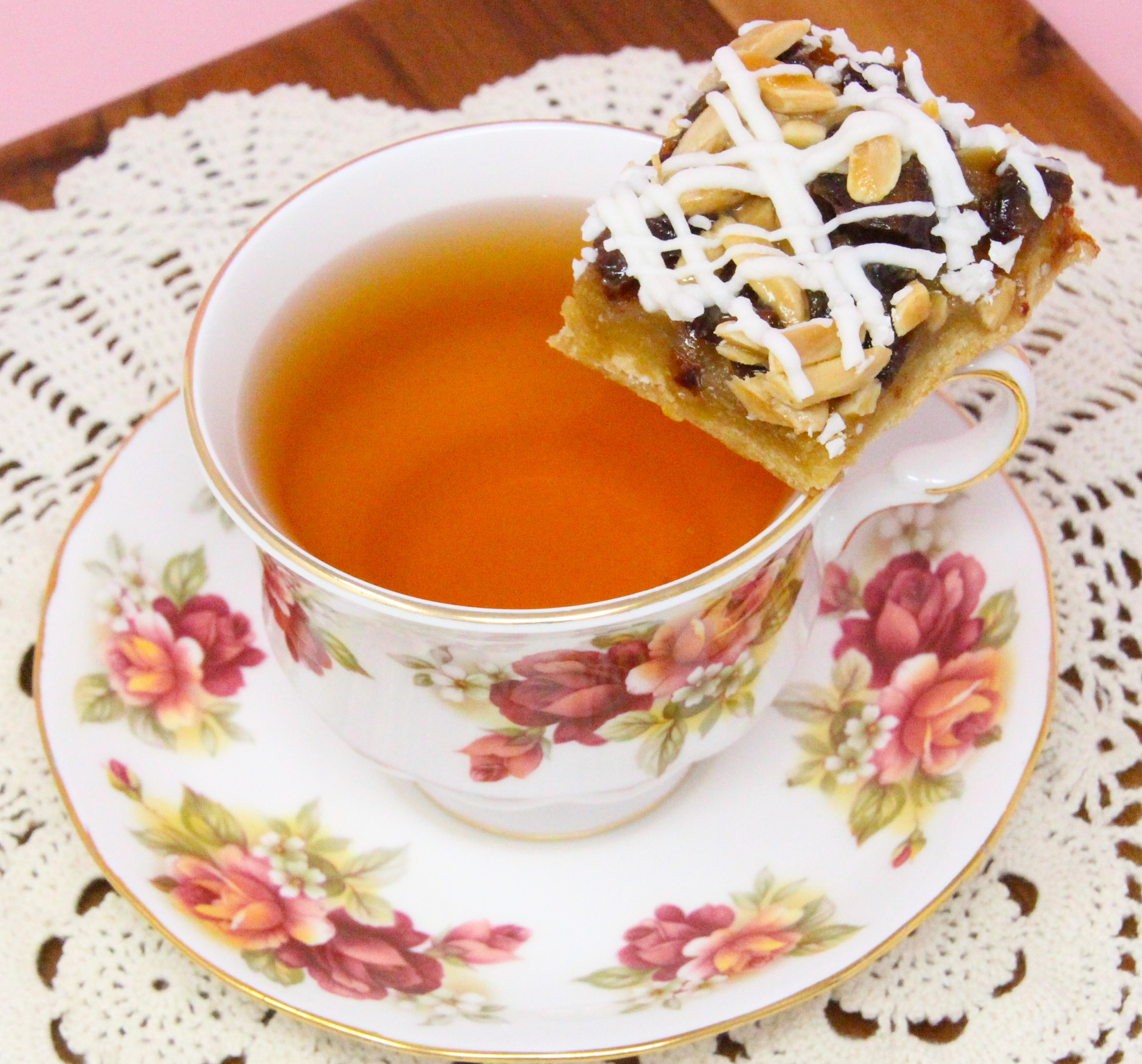 Nutty Almond Date Bars starts with a buttery, almond-flavored crust for the sweet date and crunchy almond filling. With the added white chocolate drizzle, this dessert is pure decadence and you’ll have people clamoring for more! Recipe shared with permission granted by Ellen Byron, author of SOLID GOLD MURDER. 