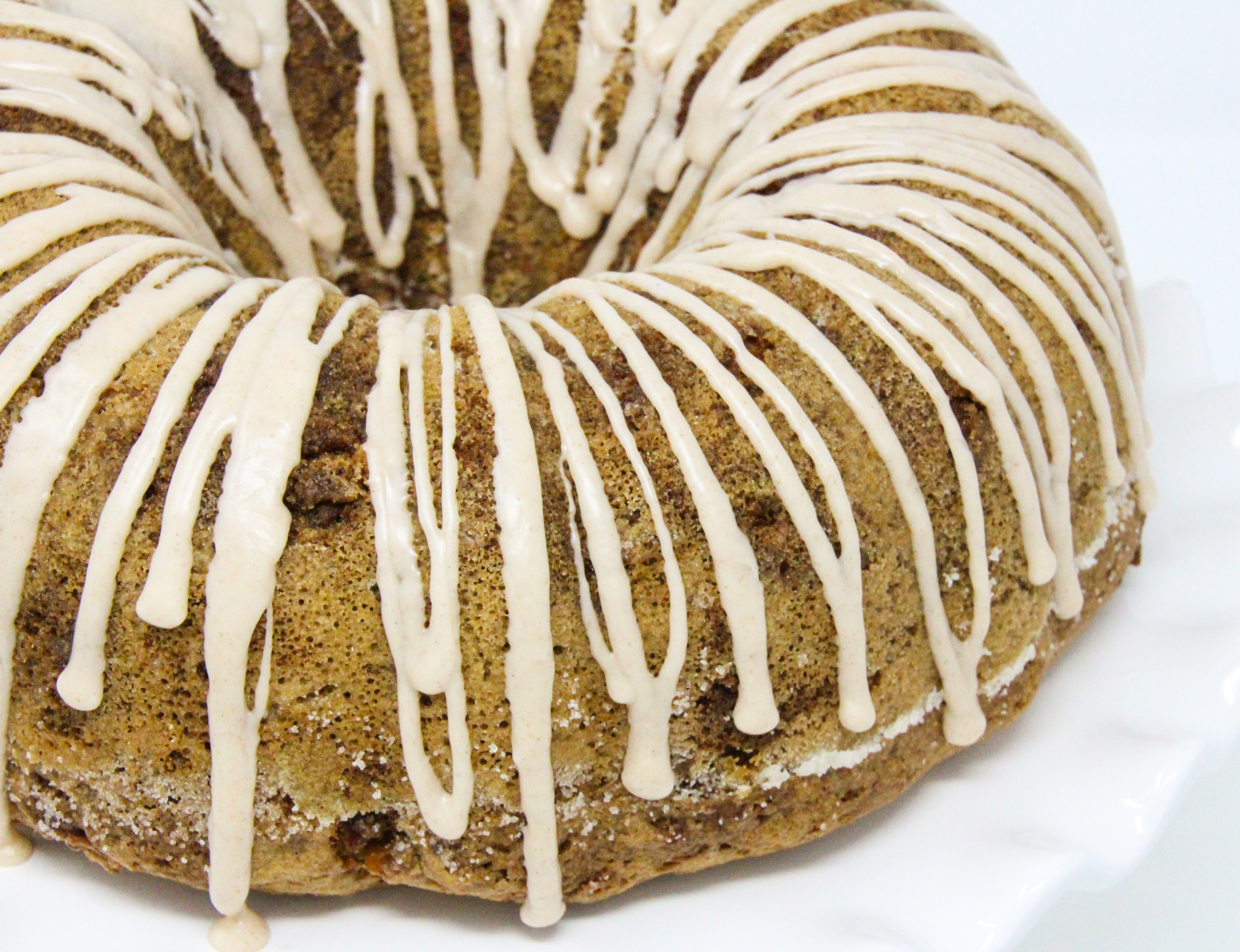Rob's Apple Cake has generous layers of apples lightly seasoned with cinnamon, while the cake holds a taste of citrus…the perfect combination! With so many apples used and a amount of vegetable oil, the cake is ultra-moist, Recipe shared with permission granted by Valerie Burns, author of ICING ON THE MURDER. 
