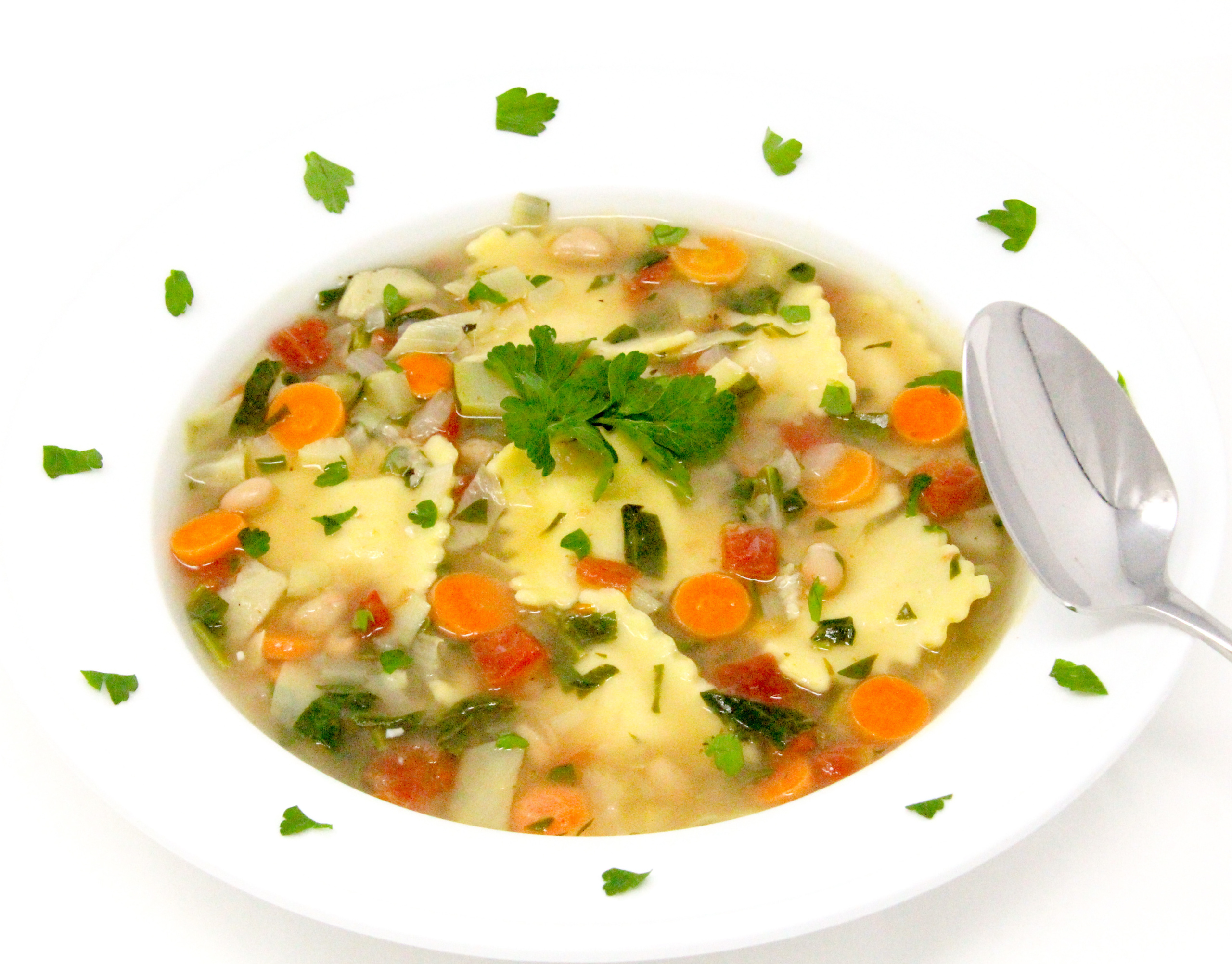Ravioli Vegetable Soup is a bowl of warm comfort, chockful of veggies and deliciousness! You can even use any kind of cheesy-filled pasta you prefer. Recipe created by Cinnamon & Sugar for Essentials of Death by Kim Davis.