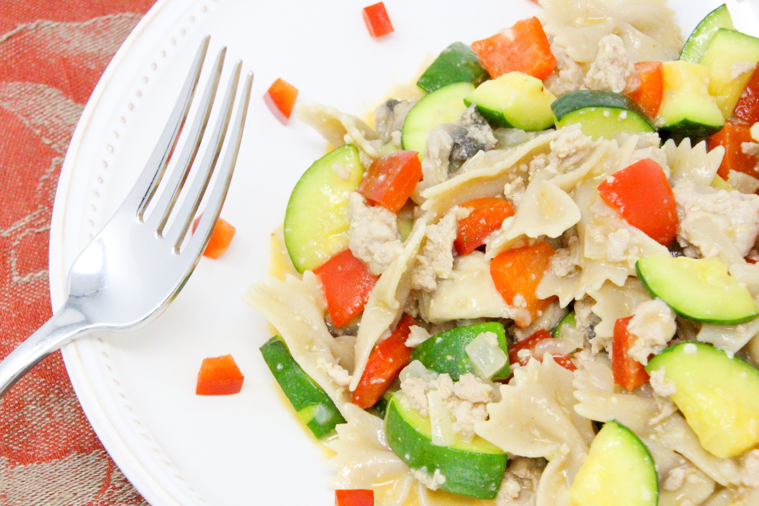 Cheesy Turkey & Veg Pasta is a delicious and filling dish featuring lean protein and plenty of vegetables, all in a cheesy sauce! Recipe shared with permission granted by Victoria Hamilton, author of THANKS FOR MUFFINS. 